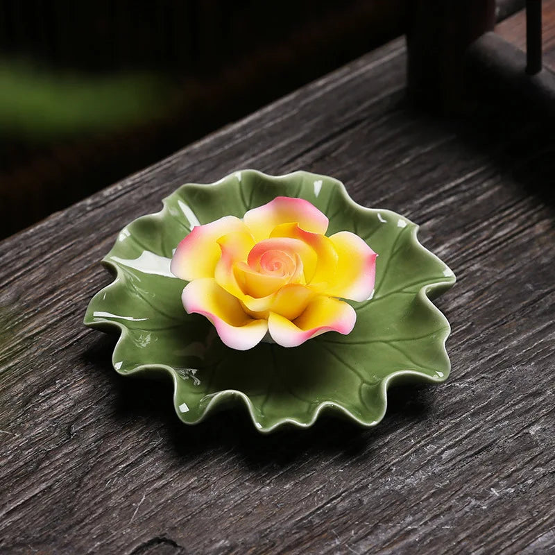 Ceramic Lotus Incense Burner - Handmade on a wooden surface, featuring a beautifully crafted lotus leaf base.