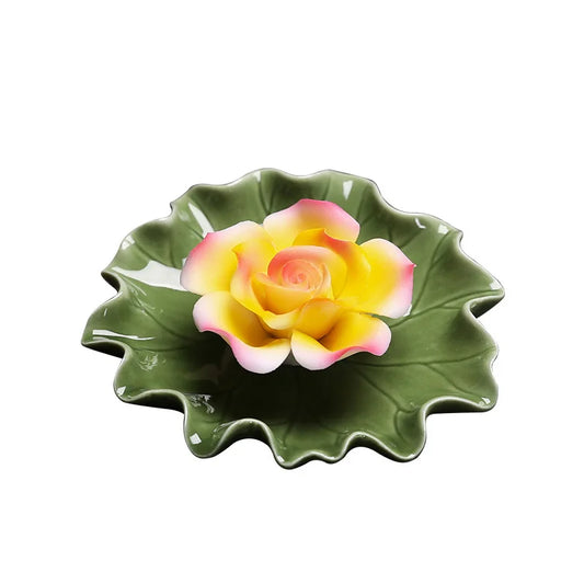 Ceramic Lotus Incense Burner - Handmade with a delicate lotus leaf design in green and pink colors.