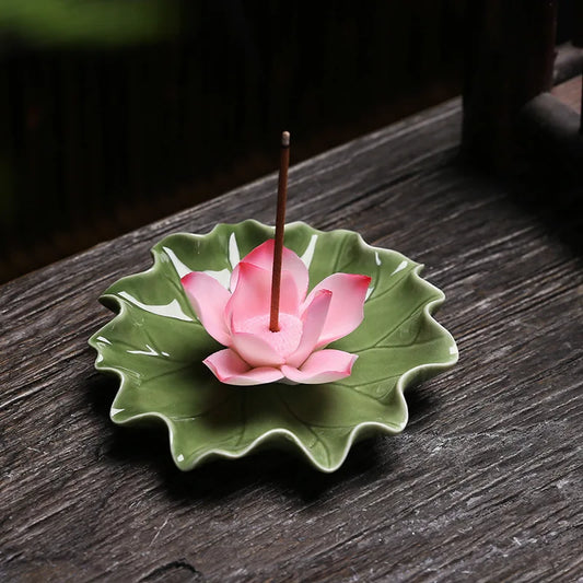 Ceramic Lotus Incense Burner - Handmade featuring a pink lotus flower design on a green leaf base.